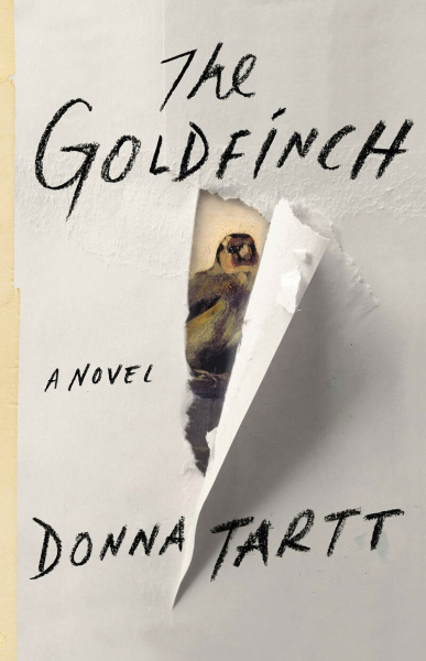 White paper torn to reveal a small painting of a goldfinch