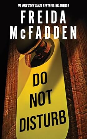 Dramatic photo of a yellow Do Not Disturb tag hanging on a doorknob.