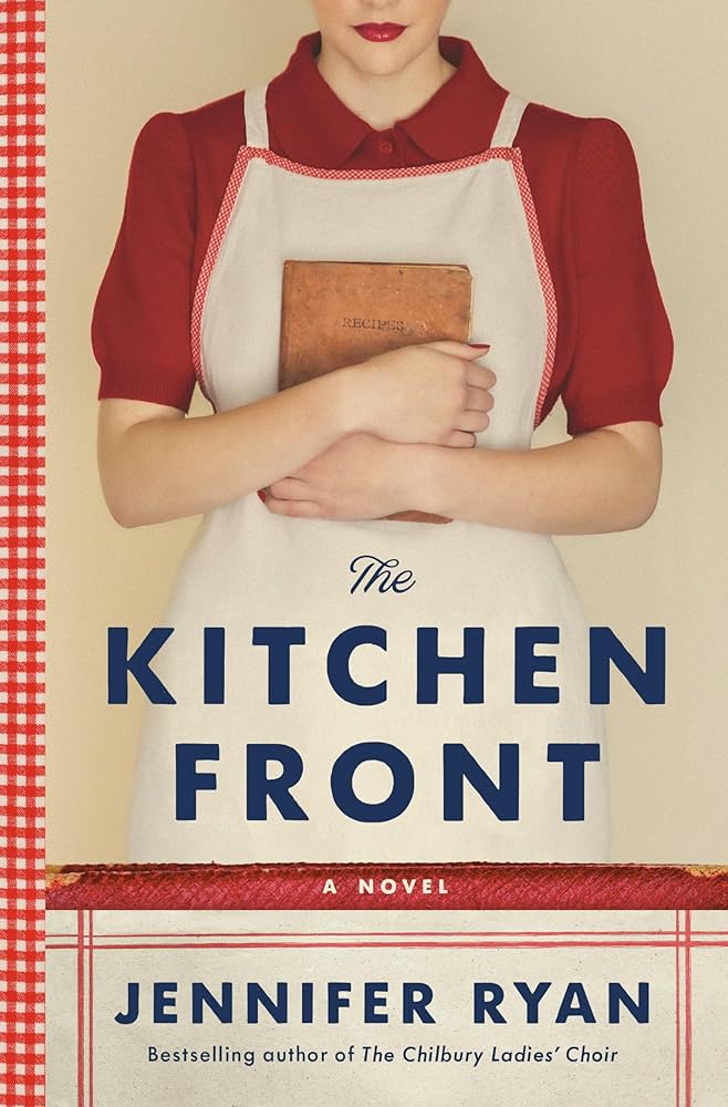 A white woman with bright red lipstick in a red blouse and vintage apron holding a notebook to her chest.